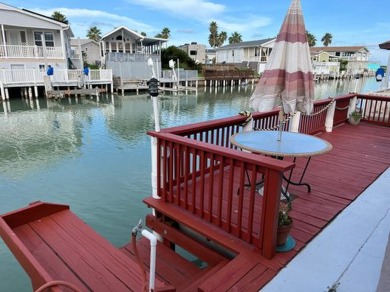 Experience coastal living at its finest with this charming on Long Island Golf Course in Texas - for sale on GolfHomes.com, golf home, golf lot