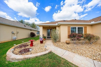 Located in Spruce Creek Golf & Country Club, this beautifully on Eagle Ridge At Spruce Creek Country Club in Florida - for sale on GolfHomes.com, golf home, golf lot