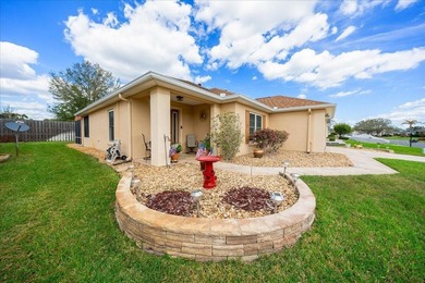 Located in Spruce Creek Golf & Country Club, this beautifully on Eagle Ridge At Spruce Creek Country Club in Florida - for sale on GolfHomes.com, golf home, golf lot