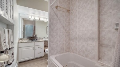Gorgeously updated and hurricane-ready, this lakefront pool home on The Meadows Golf and Country Club in Florida - for sale on GolfHomes.com, golf home, golf lot