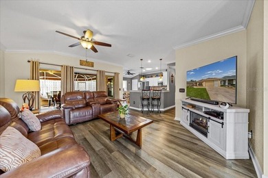 Located in Spruce Creek Golf & Country Club, this beautifully on Eagle Ridge At Spruce Creek Country Club in Florida - for sale on GolfHomes.com, golf home, golf lot