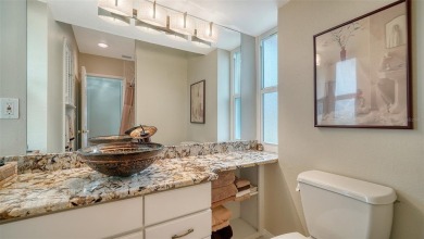 Gorgeously updated and hurricane-ready, this lakefront pool home on The Meadows Golf and Country Club in Florida - for sale on GolfHomes.com, golf home, golf lot