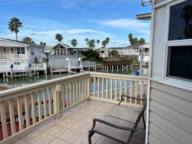 Experience coastal living at its finest with this charming on Long Island Golf Course in Texas - for sale on GolfHomes.com, golf home, golf lot