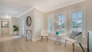 Gorgeously updated and hurricane-ready, this lakefront pool home on The Meadows Golf and Country Club in Florida - for sale on GolfHomes.com, golf home, golf lot