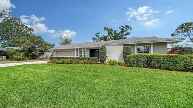 Gorgeously updated and hurricane-ready, this lakefront pool home on The Meadows Golf and Country Club in Florida - for sale on GolfHomes.com, golf home, golf lot