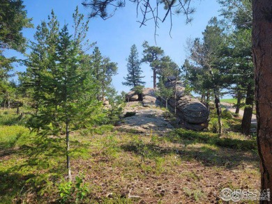 Lot 9;   Private Wooded Lot near 6th Hole in gated Fox Acres on Fox Acres Country Club in Colorado - for sale on GolfHomes.com, golf home, golf lot