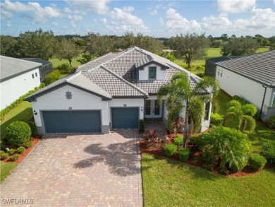 Nestled along the 15th fairway in the sought-after gated on River Hall Country Club in Florida - for sale on GolfHomes.com, golf home, golf lot