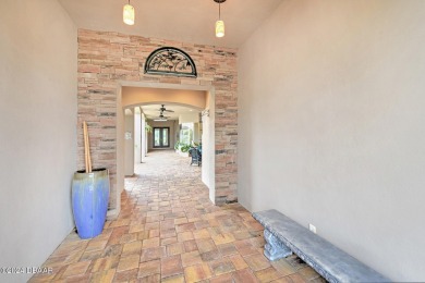 Welcome to an extraordinary opportunity to own a piece of racing on Spruce Creek Golf Club in Florida - for sale on GolfHomes.com, golf home, golf lot