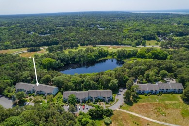 Enjoy the scenic pond view from the living room and main bedroom on Ocean Edge Resort and Golf Club in Massachusetts - for sale on GolfHomes.com, golf home, golf lot