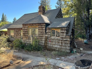 Built in 1934 Custom story book cabin. Sitting on 7.65 private on Sequoia Woods Country Club in California - for sale on GolfHomes.com, golf home, golf lot