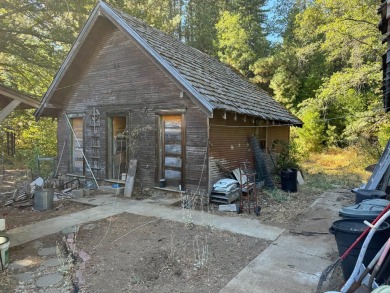 Built in 1934 Custom story book cabin. Sitting on 7.65 private on Sequoia Woods Country Club in California - for sale on GolfHomes.com, golf home, golf lot