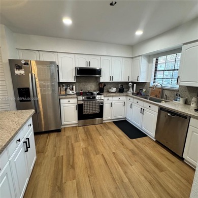 Beautifully remodeled townhome located in the desirable gated on Briar Bay Golf Course in Florida - for sale on GolfHomes.com, golf home, golf lot