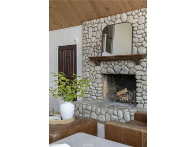 Perched in a prime first tier location, this fully renovated on Lake Arrowhead Country Club in California - for sale on GolfHomes.com, golf home, golf lot