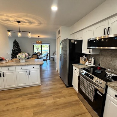 Beautifully remodeled townhome located in the desirable gated on Briar Bay Golf Course in Florida - for sale on GolfHomes.com, golf home, golf lot