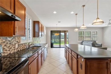WATER and SUNRISE VIEW - Enjoy serene views of the lake from the on Panther Run Golf Club in Florida - for sale on GolfHomes.com, golf home, golf lot