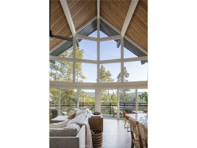 Perched in a prime first tier location, this fully renovated on Lake Arrowhead Country Club in California - for sale on GolfHomes.com, golf home, golf lot
