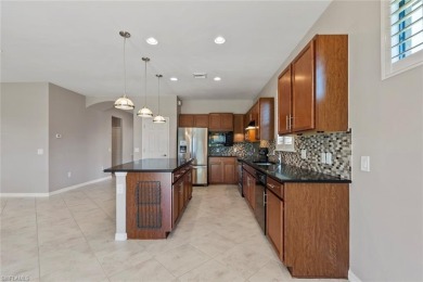 WATER and SUNRISE VIEW - Enjoy serene views of the lake from the on Panther Run Golf Club in Florida - for sale on GolfHomes.com, golf home, golf lot