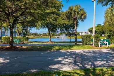 Discover this beautiful & impeccable FIRST-FLOOR condo in a on Wynmoor Golf Course in Florida - for sale on GolfHomes.com, golf home, golf lot