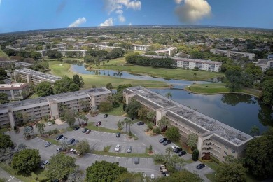 Discover this beautiful & impeccable FIRST-FLOOR condo in a on Wynmoor Golf Course in Florida - for sale on GolfHomes.com, golf home, golf lot