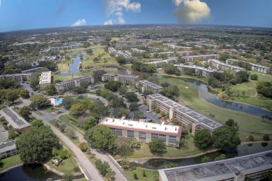 Discover this beautiful & impeccable FIRST-FLOOR condo in a on Wynmoor Golf Course in Florida - for sale on GolfHomes.com, golf home, golf lot