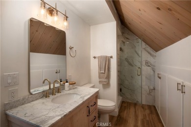 Perched in a prime first tier location, this fully renovated on Lake Arrowhead Country Club in California - for sale on GolfHomes.com, golf home, golf lot