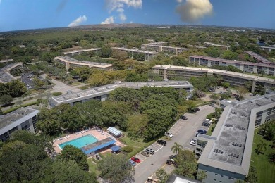 Discover this beautiful & impeccable FIRST-FLOOR condo in a on Wynmoor Golf Course in Florida - for sale on GolfHomes.com, golf home, golf lot