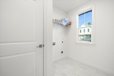 Discover refined coastal living in this beautifully upgraded on Origins Golf Club in Florida - for sale on GolfHomes.com, golf home, golf lot