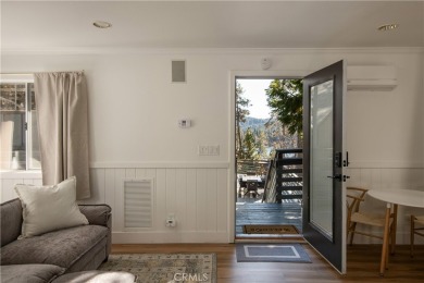 Perched in a prime first tier location, this fully renovated on Lake Arrowhead Country Club in California - for sale on GolfHomes.com, golf home, golf lot