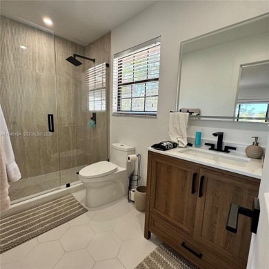 Beautifully remodeled townhome located in the desirable gated on Briar Bay Golf Course in Florida - for sale on GolfHomes.com, golf home, golf lot