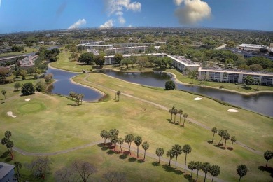 Discover this beautiful & impeccable FIRST-FLOOR condo in a on Wynmoor Golf Course in Florida - for sale on GolfHomes.com, golf home, golf lot