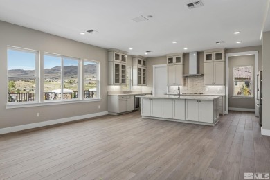 This magnificent 4-bedroom, 3.5-bathroom home in the prestigious on Somersett Country Club in Nevada - for sale on GolfHomes.com, golf home, golf lot