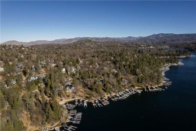 Perched in a prime first tier location, this fully renovated on Lake Arrowhead Country Club in California - for sale on GolfHomes.com, golf home, golf lot