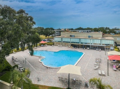 Don't miss this coveted first floor outside corner unit on On Top Of The World Golf Course in Florida - for sale on GolfHomes.com, golf home, golf lot