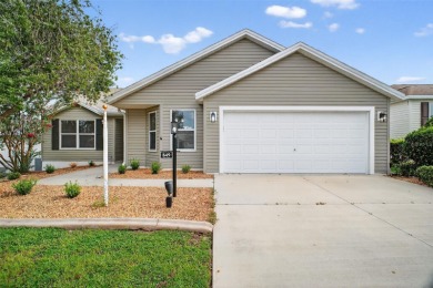 BEAUTIFULLY RENOVATED 3/2 WISTERIA MODEL with NEW ROOF (2025) on The Links of Spruce Creek in Florida - for sale on GolfHomes.com, golf home, golf lot