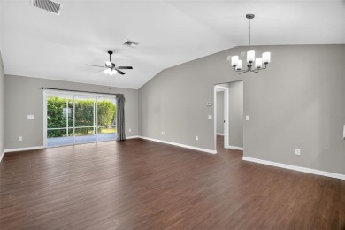 BEAUTIFULLY RENOVATED 3/2 WISTERIA MODEL with NEW ROOF (2025) on The Links of Spruce Creek in Florida - for sale on GolfHomes.com, golf home, golf lot