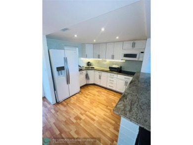 This fully renovated one-bedroom condo offers stylish comfort on Sunrise Lakes Phase III in Florida - for sale on GolfHomes.com, golf home, golf lot