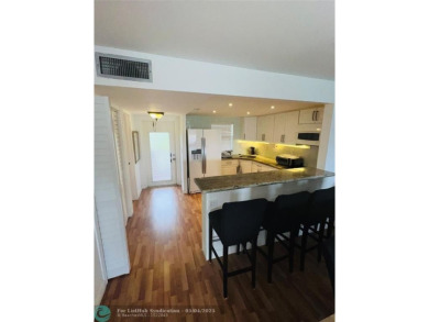 This fully renovated one-bedroom condo offers stylish comfort on Sunrise Lakes Phase III in Florida - for sale on GolfHomes.com, golf home, golf lot