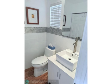 This fully renovated one-bedroom condo offers stylish comfort on Sunrise Lakes Phase III in Florida - for sale on GolfHomes.com, golf home, golf lot