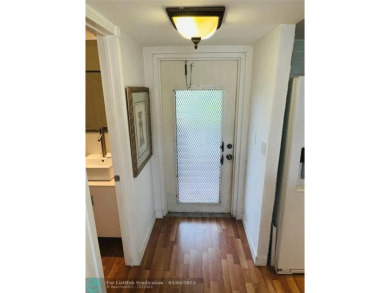 This fully renovated one-bedroom condo offers stylish comfort on Sunrise Lakes Phase III in Florida - for sale on GolfHomes.com, golf home, golf lot