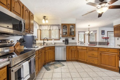 Welcome to this stunning 4-bedroom, 3-bath all-brick home on Myrtle Beach National Golf Course in South Carolina - for sale on GolfHomes.com, golf home, golf lot