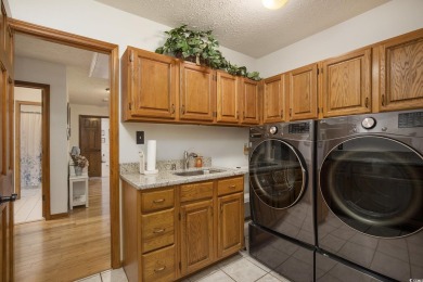 Welcome to this stunning 4-bedroom, 3-bath all-brick home on Myrtle Beach National Golf Course in South Carolina - for sale on GolfHomes.com, golf home, golf lot