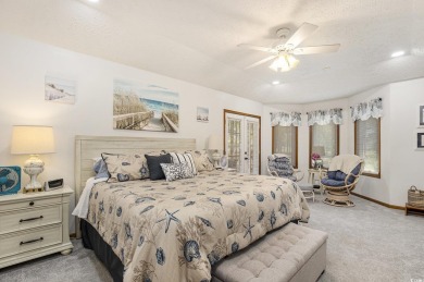 Welcome to this stunning 4-bedroom, 3-bath all-brick home on Myrtle Beach National Golf Course in South Carolina - for sale on GolfHomes.com, golf home, golf lot
