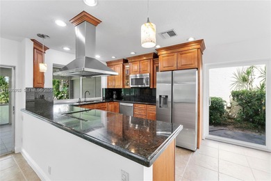 Discover Paradise. Beautifully renovated home, ideally located on The Country Club At Boca Raton in Florida - for sale on GolfHomes.com, golf home, golf lot