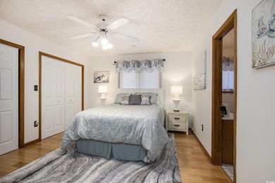 Welcome to this stunning 4-bedroom, 3-bath all-brick home on Myrtle Beach National Golf Course in South Carolina - for sale on GolfHomes.com, golf home, golf lot