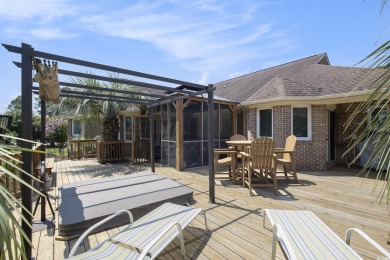 Welcome to this stunning 4-bedroom, 3-bath all-brick home on Myrtle Beach National Golf Course in South Carolina - for sale on GolfHomes.com, golf home, golf lot