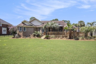 Welcome to this stunning 4-bedroom, 3-bath all-brick home on Myrtle Beach National Golf Course in South Carolina - for sale on GolfHomes.com, golf home, golf lot