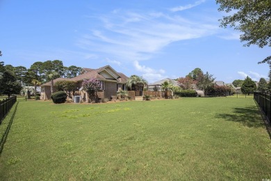 Welcome to this stunning 4-bedroom, 3-bath all-brick home on Myrtle Beach National Golf Course in South Carolina - for sale on GolfHomes.com, golf home, golf lot
