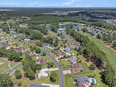 Welcome to this stunning 4-bedroom, 3-bath all-brick home on Myrtle Beach National Golf Course in South Carolina - for sale on GolfHomes.com, golf home, golf lot