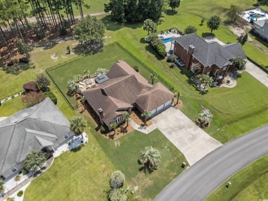 Welcome to this stunning 4-bedroom, 3-bath all-brick home on Myrtle Beach National Golf Course in South Carolina - for sale on GolfHomes.com, golf home, golf lot