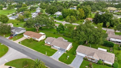 Well Maintained *Pecan* Model in Spruce Creek South - 55+ Gated on The Links of Spruce Creek in Florida - for sale on GolfHomes.com, golf home, golf lot